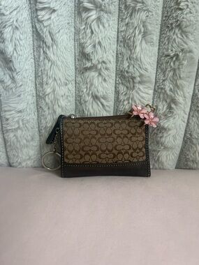 Brown Signature Pattern Zip Card Case with Pink Flower Charm